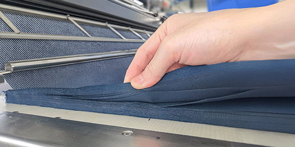 OSHIMA-Blog-What-is-a-Fabric-Spreading-Machine-600x300